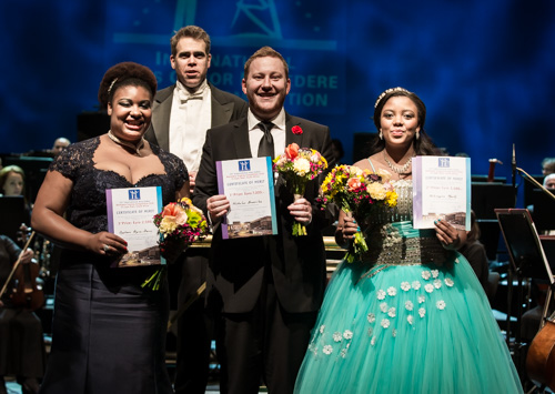 From left to right: RAEHANN BRYCE-DAVIS (3rd Prize), NICHOLAS BROWNLEE (1st Prize), NOLUVUYISO MPOFU (2nd Prize + Audience Prize). In the back: Conductor Kamal Khan of the Cape Town Philharmonic Orchestra.
