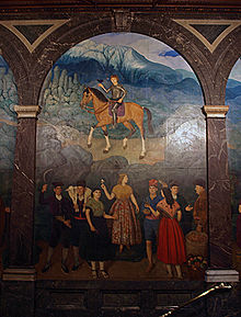 AT the top of the Honor staircase in Black Marble, is a large mural by Miguel Viladrich (1930). The mural depicts people dressed in the traditional costumes of different areas of Catalonia, detail of the large mural.